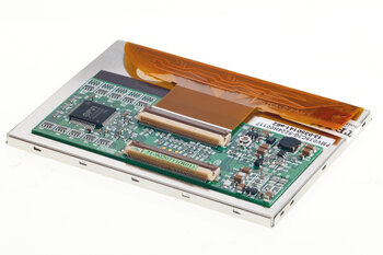 Elektronisches Bauteil mit einem brauntransparenten Formstanzteil. 