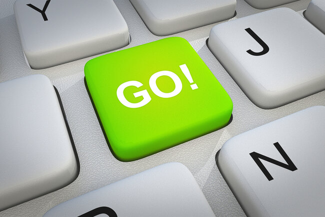 Grüne Taste auf einer PC-Tastatur, beschriftet mit «Go»